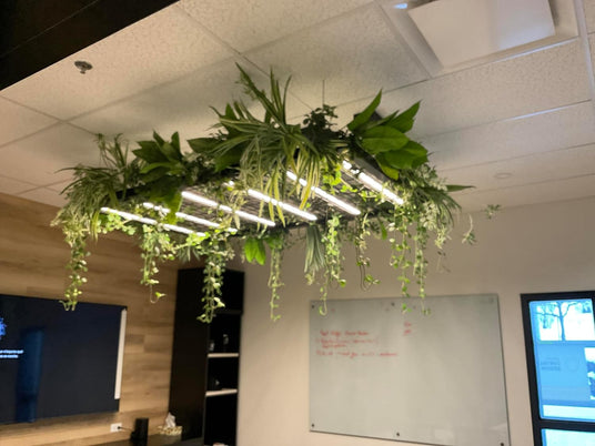 Ceiling-mounted lighting fixture with integrated greenery and LED lights